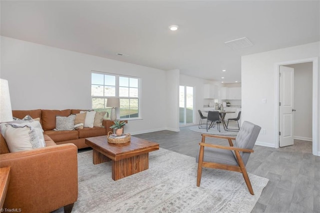 248 Warbler Way, Lexington, NC 27295 - living area with light wood finished floors, baseboards, and recessed lighting