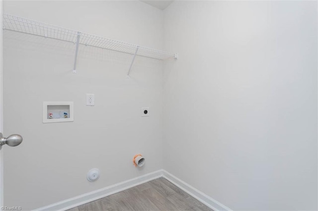 248 Warbler Way, Lexington, NC 27295 - washroom featuring hookup for a washing machine, baseboards, wood finished floors, hookup for an electric dryer, and hookup for a gas dryer