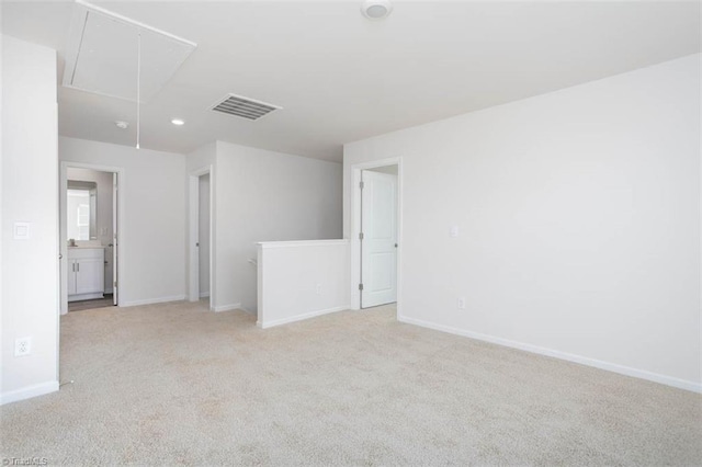 248 Warbler Way, Lexington, NC 27295 - spare room featuring attic access, light carpet, baseboards, and recessed lighting