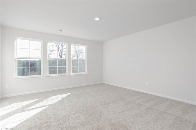 248 Warbler Way, Lexington, NC 27295 - spare room with light carpet, baseboards, and recessed lighting
