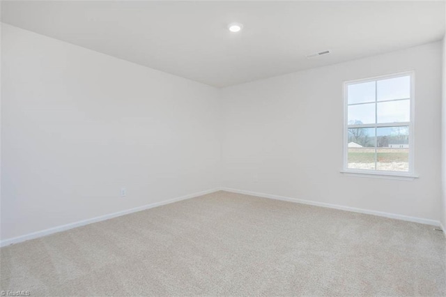 248 Warbler Way, Lexington, NC 27295 - spare room featuring baseboards, light carpet, and recessed lighting