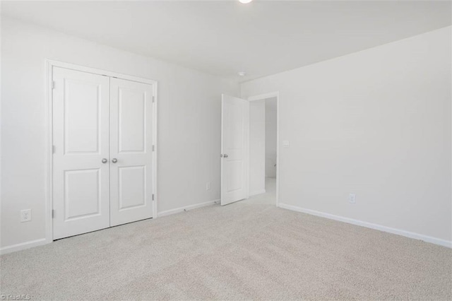 248 Warbler Way, Lexington, NC 27295 - unfurnished bedroom with carpet floors, baseboards, and a closet