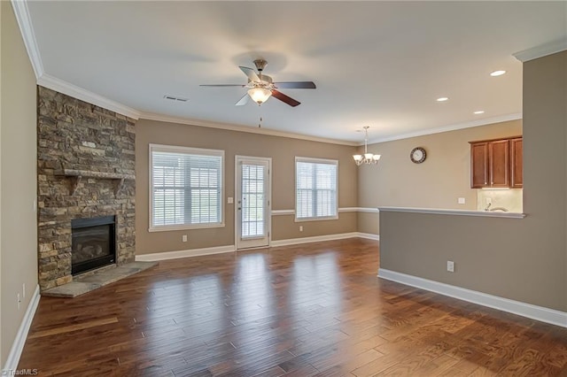 241 Collingswood Dr, Winston-Salem, NC 27127 - unfurnished living room with a ceiling fan, a chandelier, a stone fireplace, ornamental molding, and baseboards
