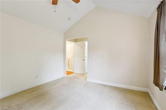 unfurnished room with ceiling fan, light carpet, and high vaulted ceiling