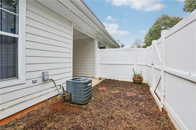 view of yard with central AC