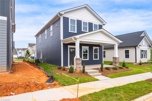 1416 Prospect Hill St, Kernersville, NC 27284 - view of front of home featuring covered porch and central air condition unit