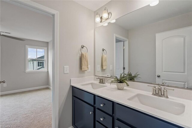 1416 Prospect Hill St, Kernersville, NC 27284 - bathroom featuring double vanity and baseboards
