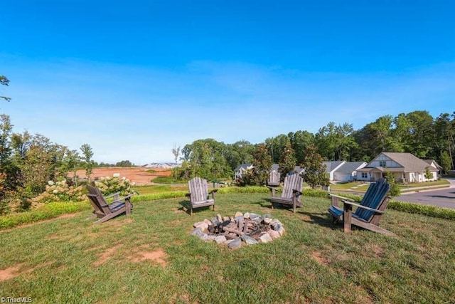 1416 Prospect Hill St, Kernersville, NC 27284 - view of grassy yard with an outdoor fire pit