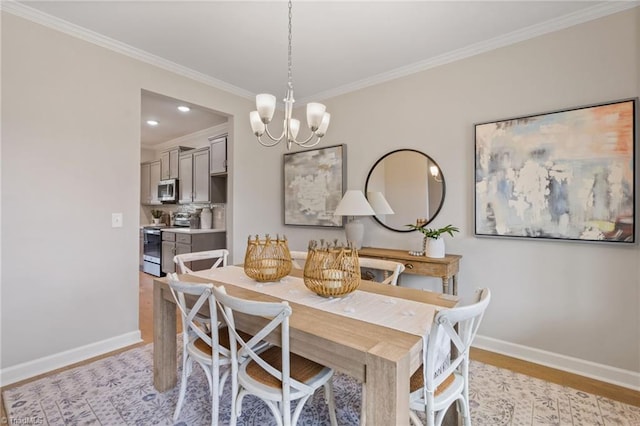 1416 Prospect Hill St, Kernersville, NC 27284 - dining room with light wood-type flooring, ornamental molding, a chandelier, baseboards, and recessed lighting