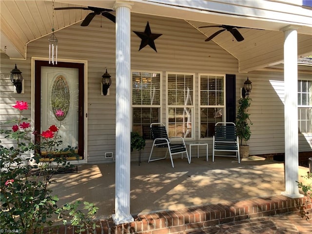 exterior space featuring covered porch and a ceiling fan