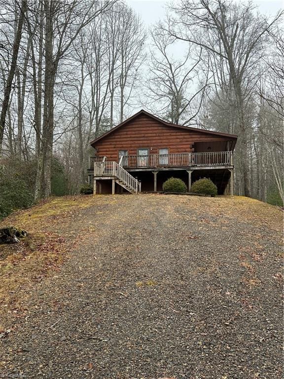 view of front of house featuring a wooden deck