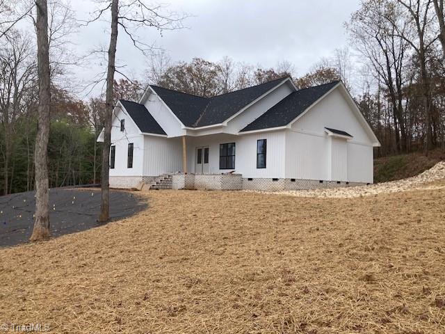 exterior space with crawl space