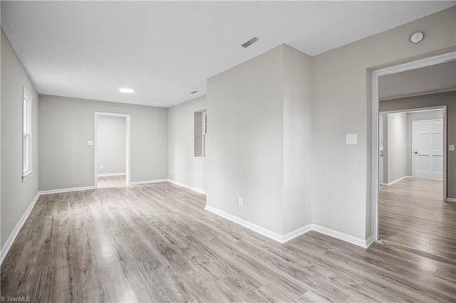 empty room featuring light hardwood / wood-style floors