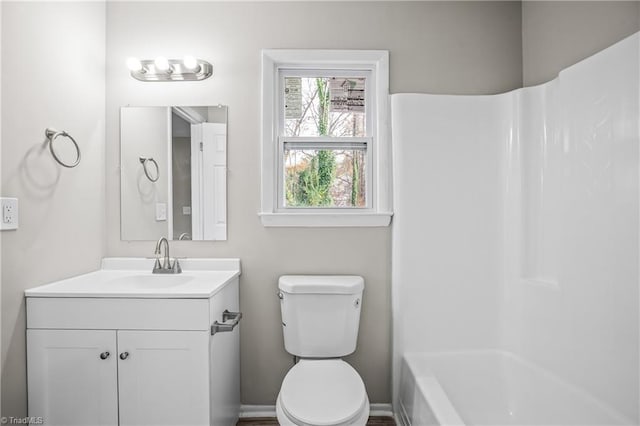 full bathroom featuring vanity, toilet, and bathing tub / shower combination