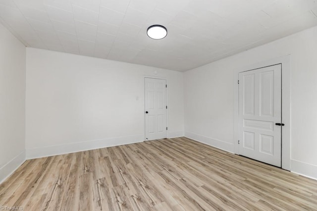 1524 E 14th St, Winston-Salem, NC 27105 - unfurnished room featuring light wood-style flooring and baseboards