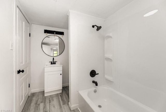 1524 E 14th St, Winston-Salem, NC 27105 - bathroom with vanity, wood finished floors,  shower combination, and crown molding