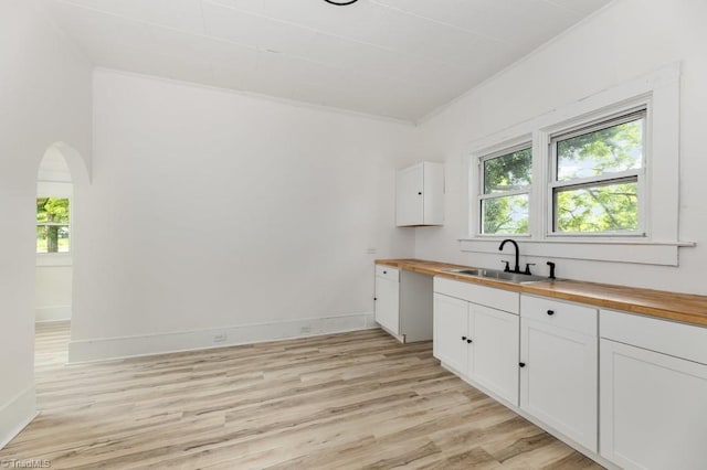 1524 E 14th St, Winston-Salem, NC 27105 - kitchen with wooden counters, light wood-type flooring, plenty of natural light, and white cabinetry