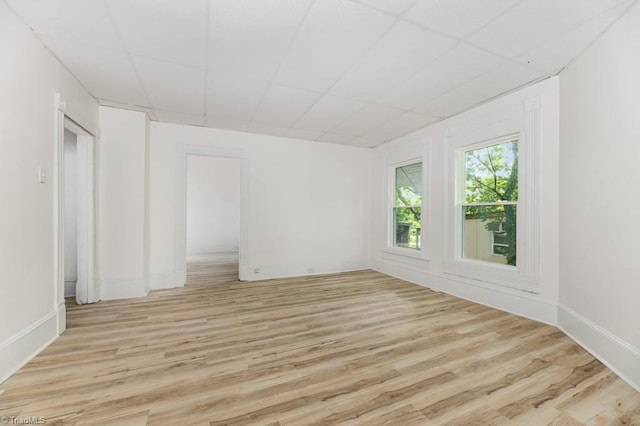 1524 E 14th St, Winston-Salem, NC 27105 - empty room with light wood-style flooring and baseboards