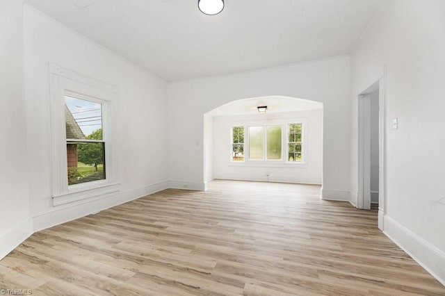 1524 E 14th St, Winston-Salem, NC 27105 - spare room with light wood-type flooring and arched walkways