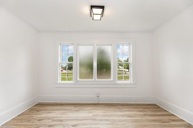 1524 E 14th St, Winston-Salem, NC 27105 - empty room with light wood-style flooring and baseboards
