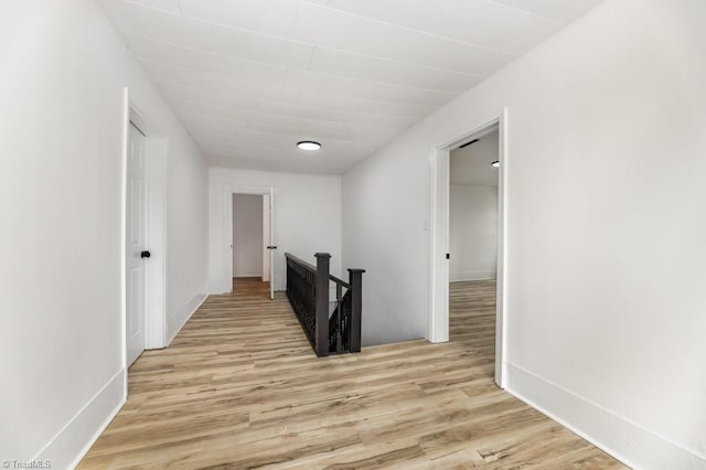 1524 E 14th St, Winston-Salem, NC 27105 - corridor with an upstairs landing and light wood-style floors