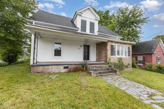 1524 E 14th St, Winston-Salem, NC 27105 - view of front facade featuring covered porch, a front yard, and a shingled roof