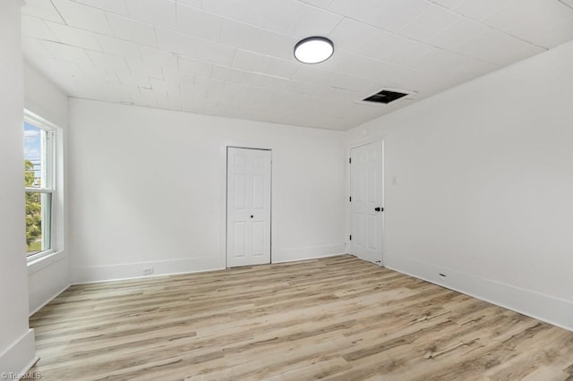 1524 E 14th St, Winston-Salem, NC 27105 - unfurnished room with light wood-type flooring and baseboards