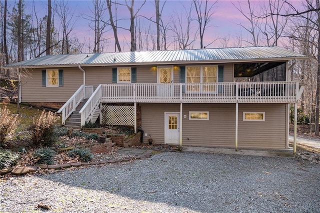 view of front facade featuring a wooden deck