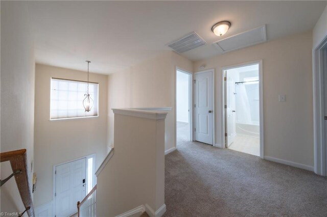 6015 Accord Ct, Pfafftown, NC 27040 - hall with an upstairs landing and carpet