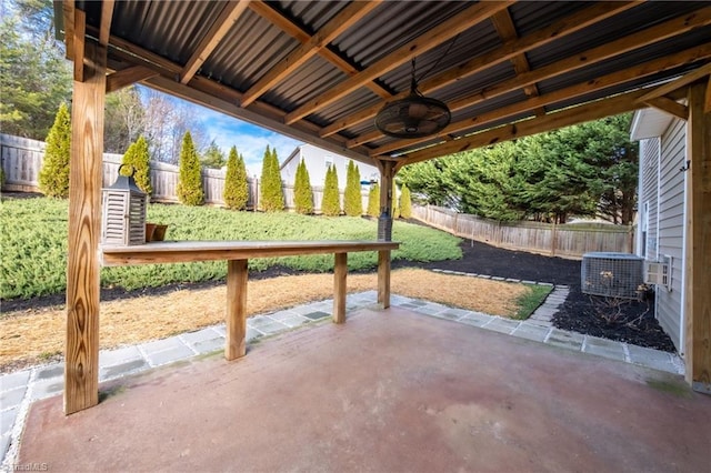 6015 Accord Ct, Pfafftown, NC 27040 - fenced backyard with a patio area and a ceiling fan