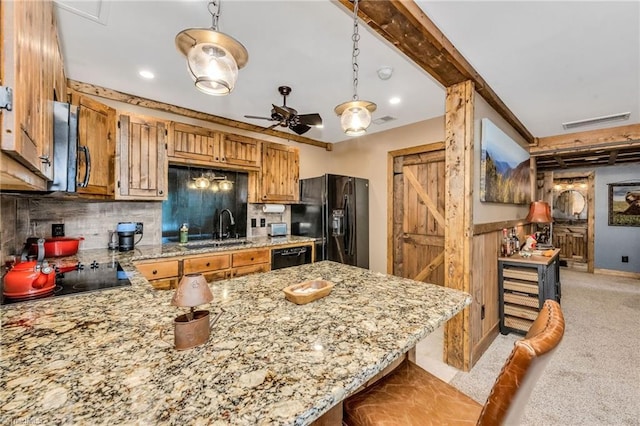 883 Wagon Ridge Ln, Ferguson, NC 28624 - kitchen featuring black appliances, a sink, tasteful backsplash, brown cabinets, and ceiling fan