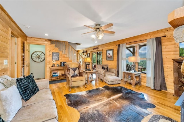 883 Wagon Ridge Ln, Ferguson, NC 28624 - living area with wooden walls, stairway, wood finished floors, a ceiling fan, and recessed lighting
