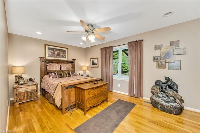 883 Wagon Ridge Ln, Ferguson, NC 28624 - bedroom with light wood-style flooring, recessed lighting, baseboards, and a ceiling fan