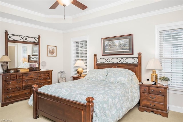 bedroom featuring light carpet, ceiling fan, and ornamental molding