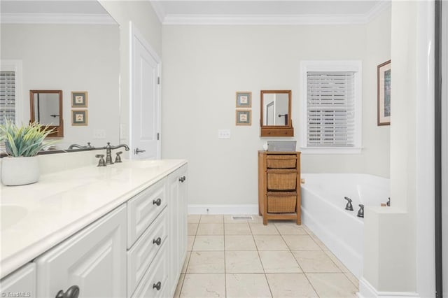 bathroom with vanity, ornamental molding, and a washtub