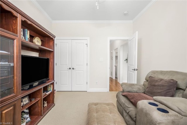 living room with ornamental molding and light carpet