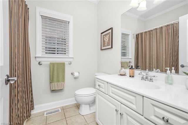 bathroom with tile patterned floors, vanity, toilet, and crown molding