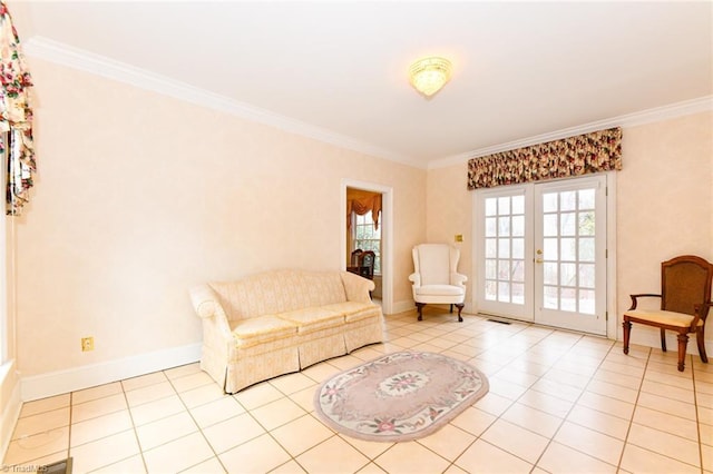 living area featuring crown molding, french doors, and light tile patterned flooring