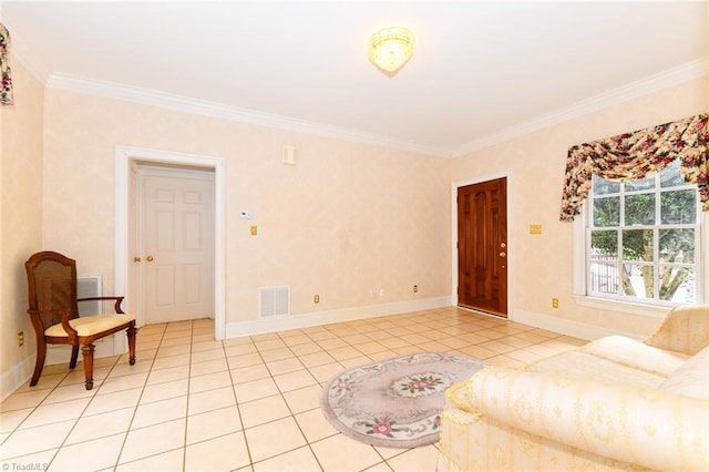 living room featuring ornamental molding and light tile patterned flooring