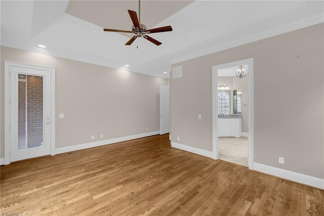 unfurnished room with visible vents, baseboards, light wood-style flooring, ceiling fan, and recessed lighting