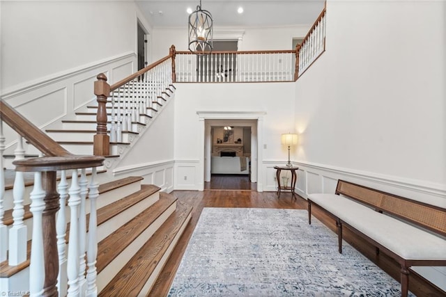 interior space featuring hardwood / wood-style flooring and a notable chandelier