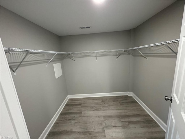 5515 Bethania Rd, Pfafftown, NC 27040 - spacious closet with wood finished floors