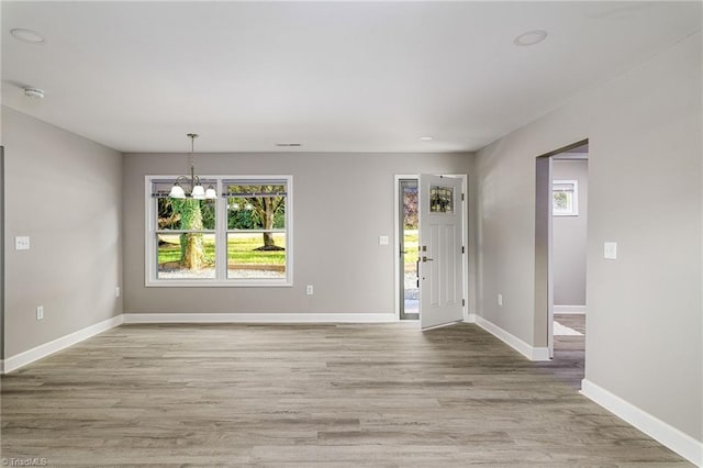 5515 Bethania Rd, Pfafftown, NC 27040 - entryway featuring a chandelier and light wood-style floors