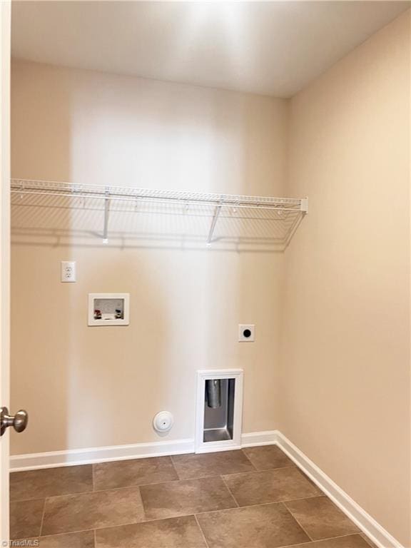 washroom with laundry area, washer hookup, electric dryer hookup, and baseboards