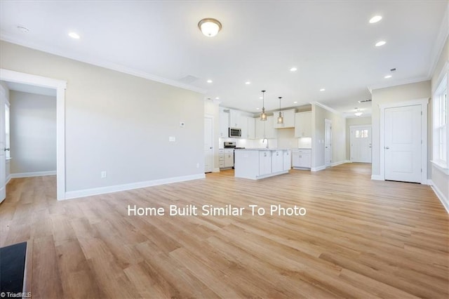 unfurnished living room with baseboards, light wood-style flooring, and crown molding