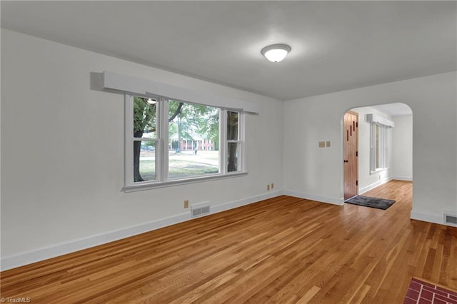 empty room with light wood-type flooring