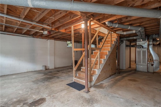 basement featuring heating unit