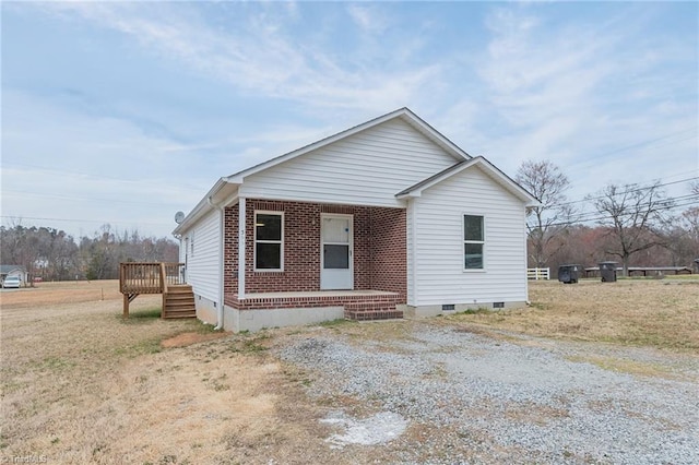 bungalow-style home with crawl space and covered porch