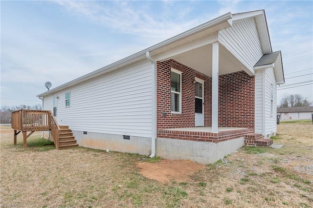 view of property exterior featuring crawl space