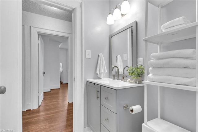 1501 Wiltshire St, High Point, NC 27265 - bathroom with vanity and wood finished floors